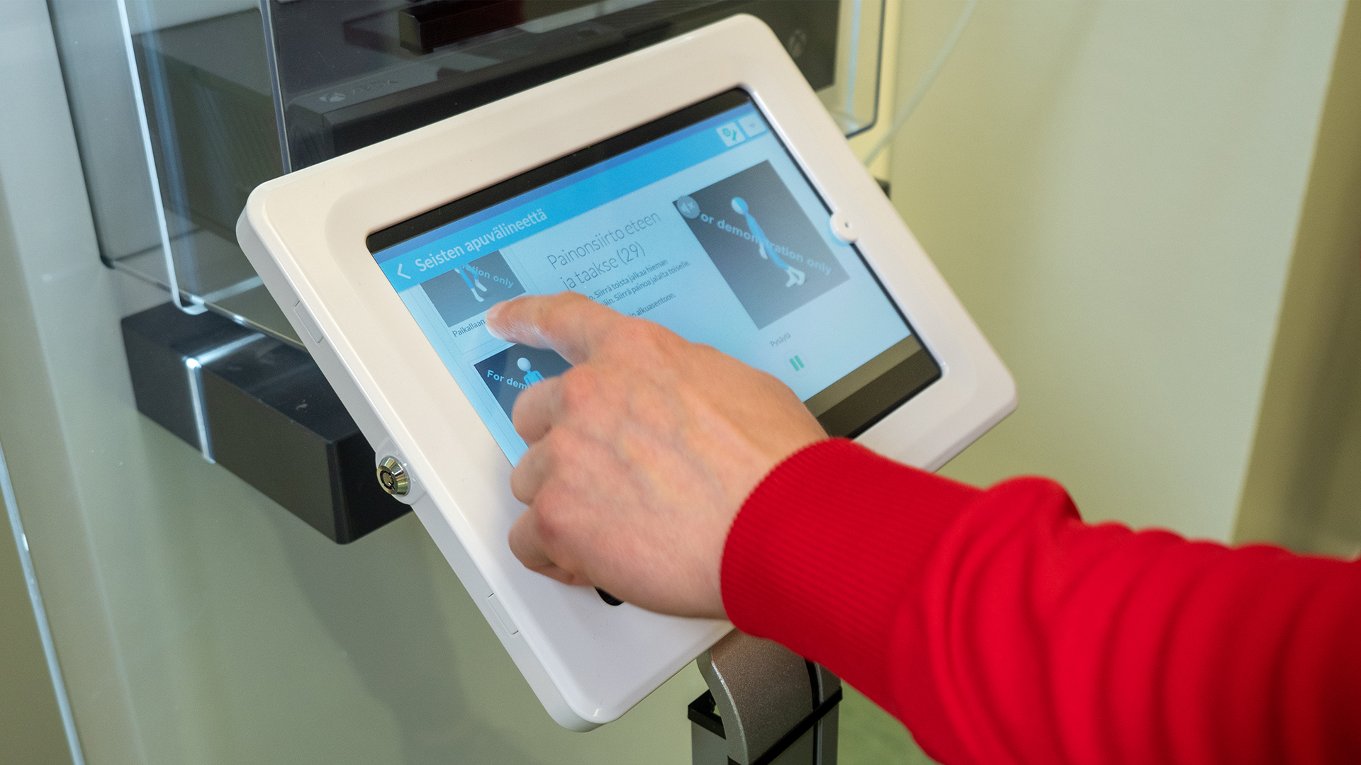 Kiosk Trainer kuntoutuspisteen näyttö