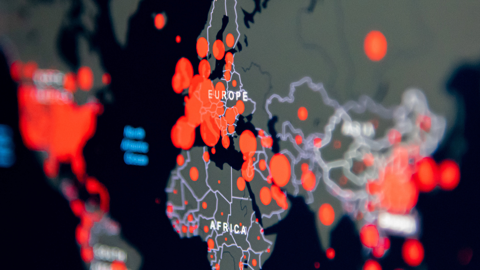 World map of the corona situation with red dots.