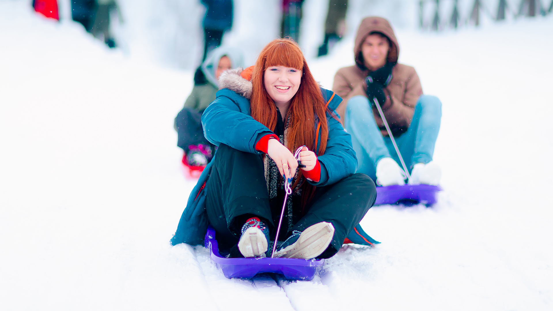 Sledding students