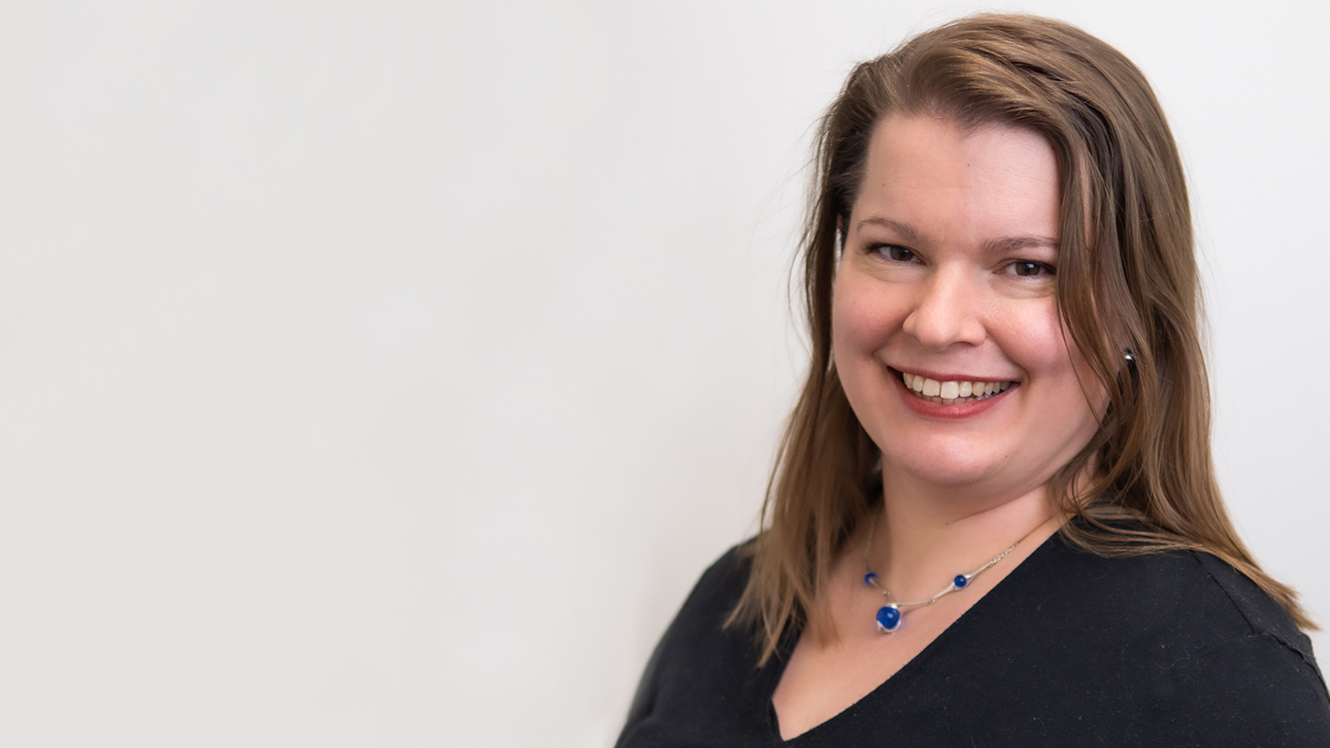 In the picture is a women and a student, who name is Satu Korhonen