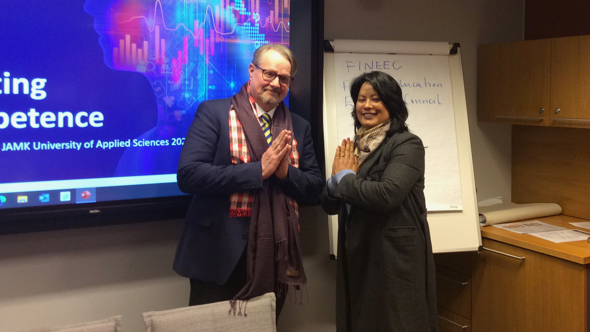 Jamk's rector Vesa Saarikoski with Dr. Ruma Manandhar