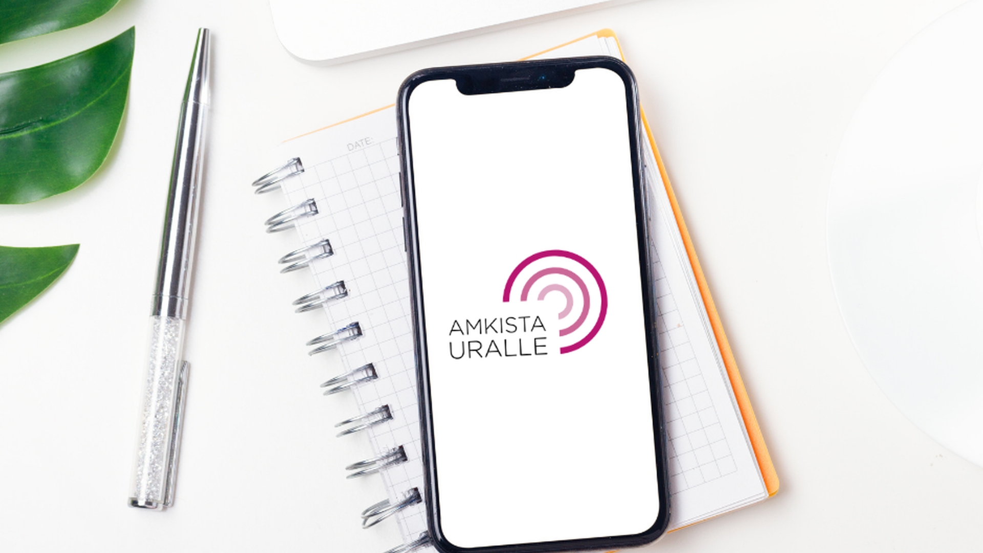 Puhelin, kynä, muistivihko, Amkista uralle-teksti