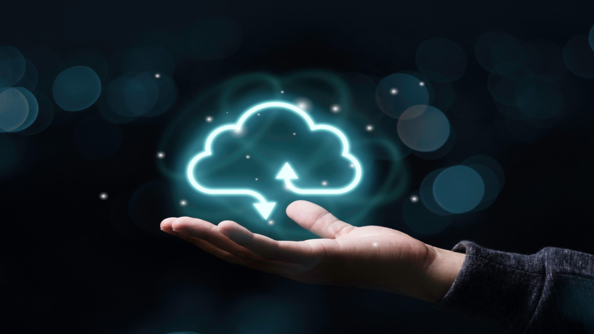 Artificial image of hand holding a cloud