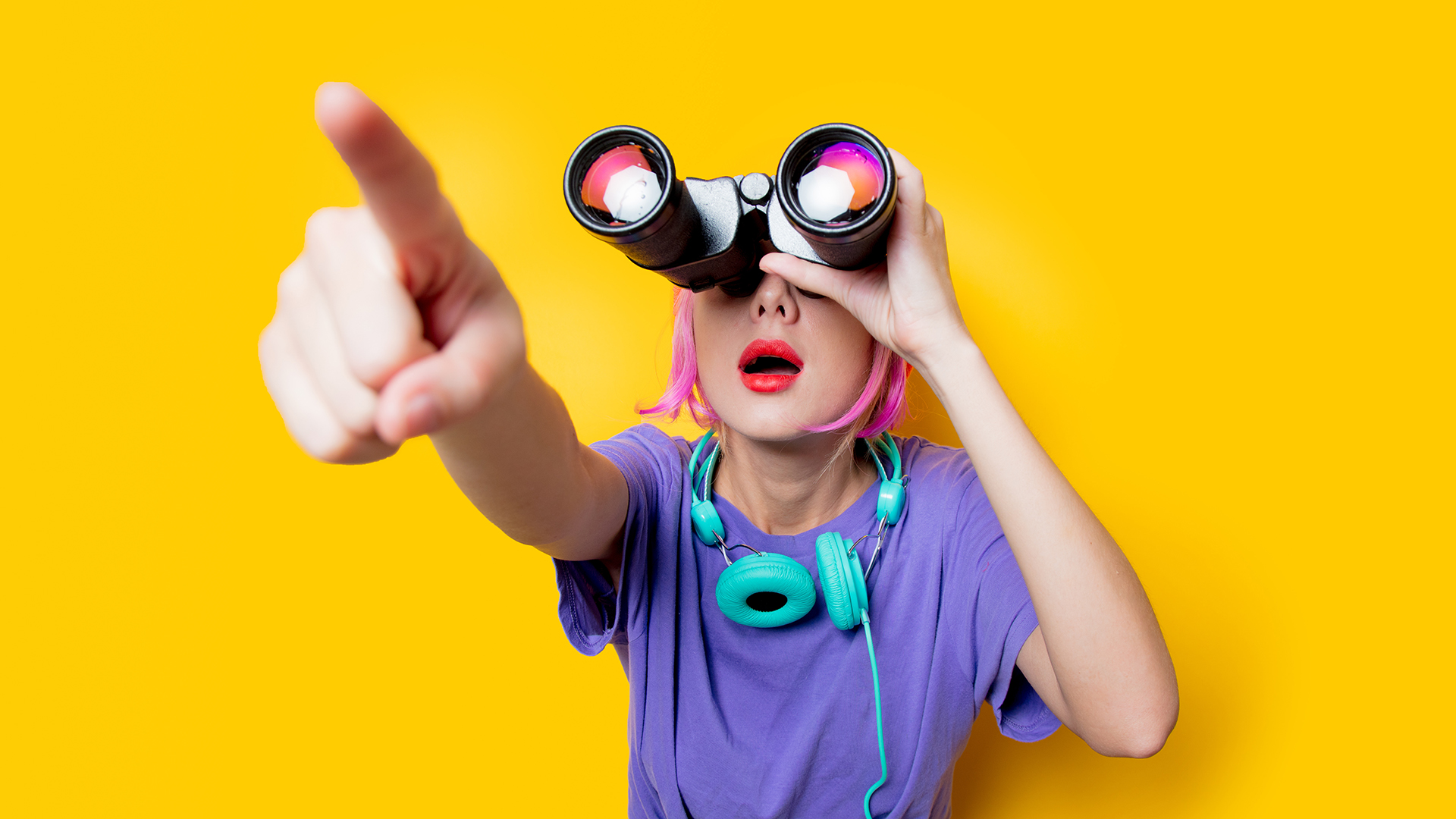 Girl in purple clothes with binoculars on yellow background