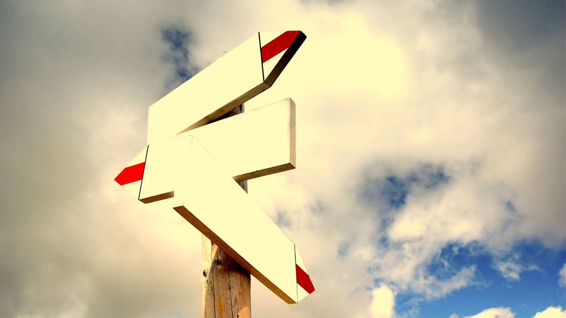 a roadway sign pointing the way.