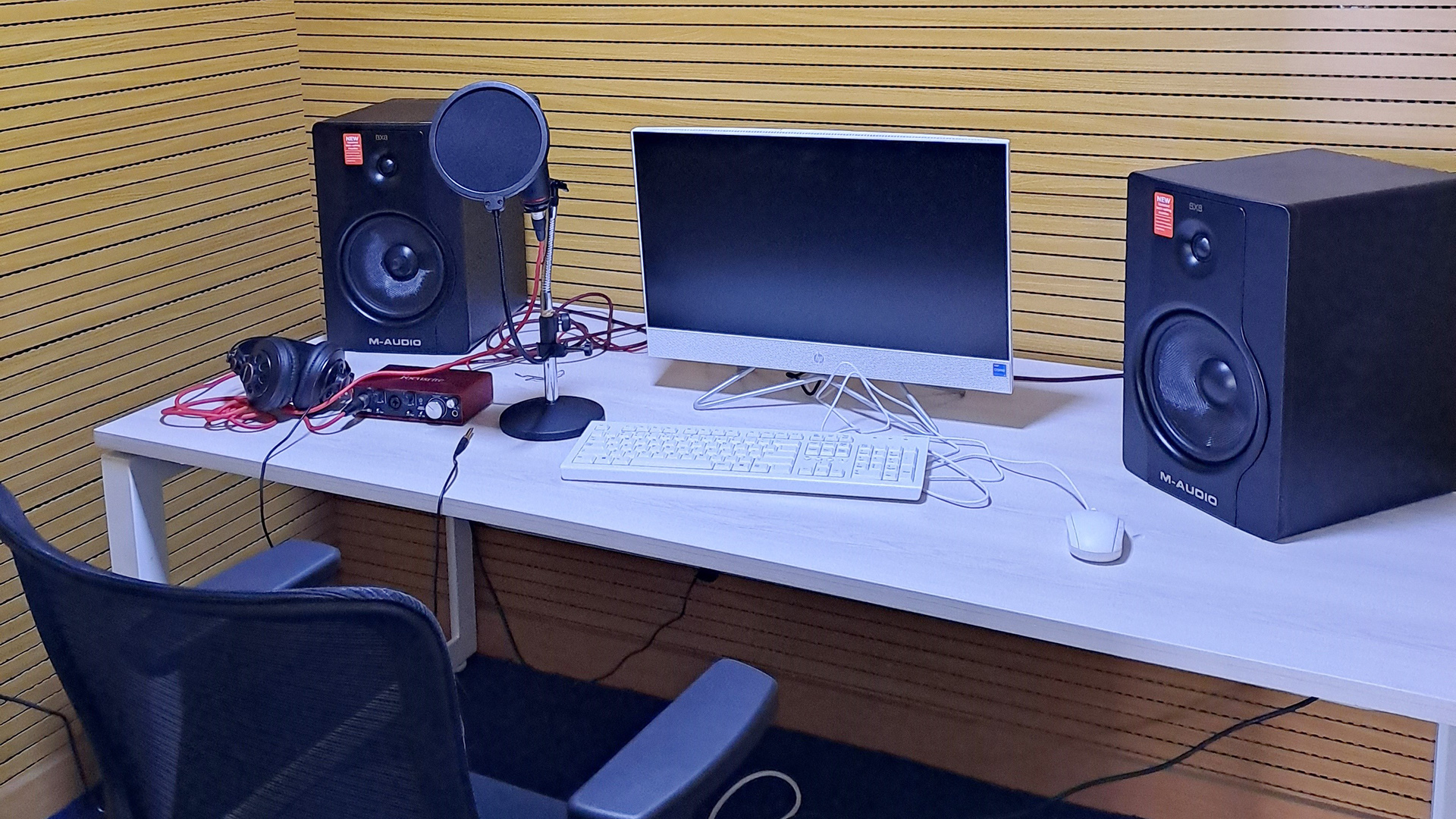 Work station at the digital centre, loud speakers, computer screen and other equipment
