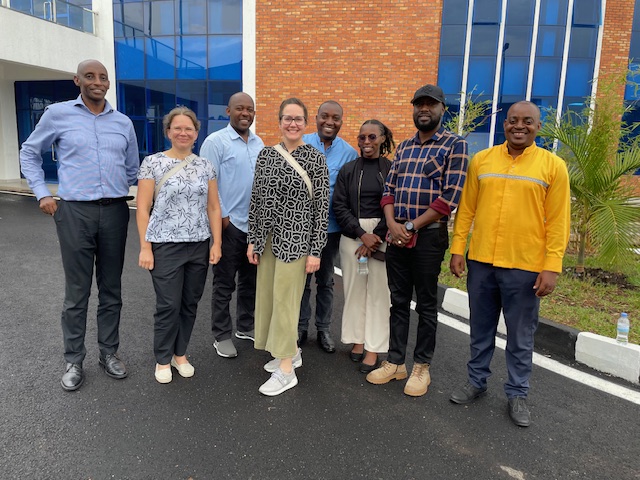 Group of people standing outside the university building