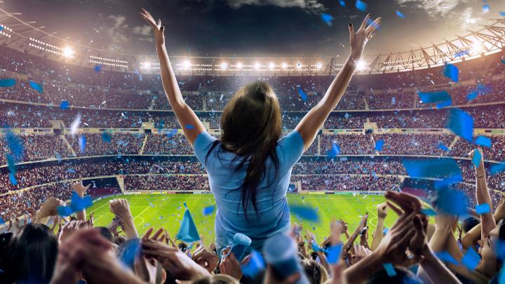 Female cheering at stadium