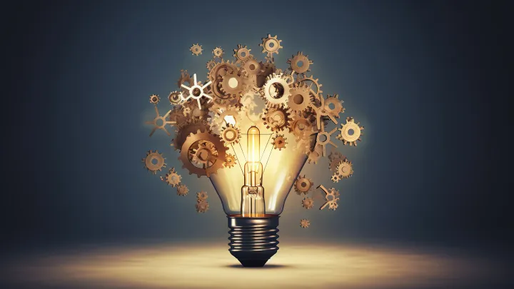 Lamppu, jonka ympärillä on erikokoisia rataksia